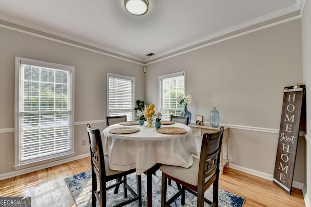 4901 Briarleigh Chase SW, Mableton, GA 30126 - dining room with light wood-style floors and ornamental molding
