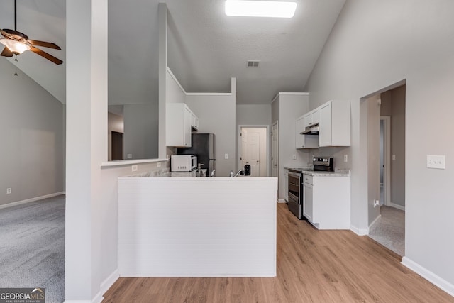 305 Overland Trl, Temple, GA 30179 - kitchen featuring stainless steel electric stove, white microwave, ceiling fan, white cabinetry, and light countertops