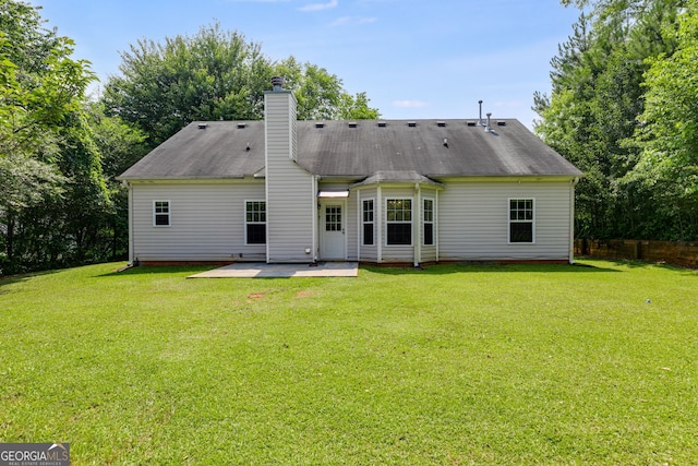 305 Overland Trl, Temple, GA 30179 - rear view of house featuring a patio area and a chimney