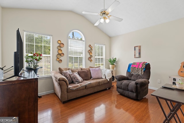8180 Chapman Ter, Mcdonough, GA 30252 - living room with ceiling fan, wood finished floors, lofted ceiling, and baseboards