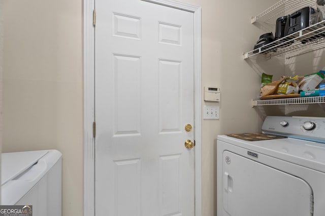 8180 Chapman Ter, Mcdonough, GA 30252 - washroom with washing machine and clothes dryer