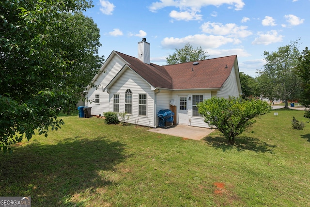 8180 Chapman Ter, Mcdonough, GA 30252 - rear view of property featuring a patio, a chimney, and a yard