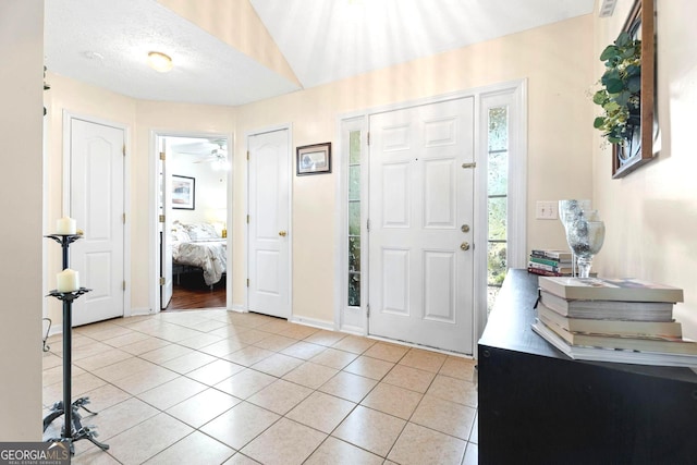 8180 Chapman Ter, Mcdonough, GA 30252 - foyer featuring light tile patterned floors and baseboards