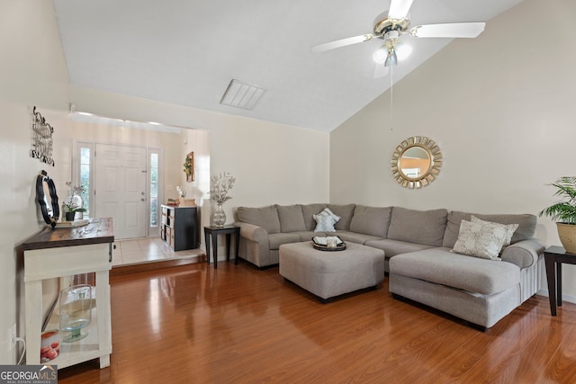 8180 Chapman Ter, Mcdonough, GA 30252 - living room featuring lofted ceiling, wood finished floors, and a ceiling fan