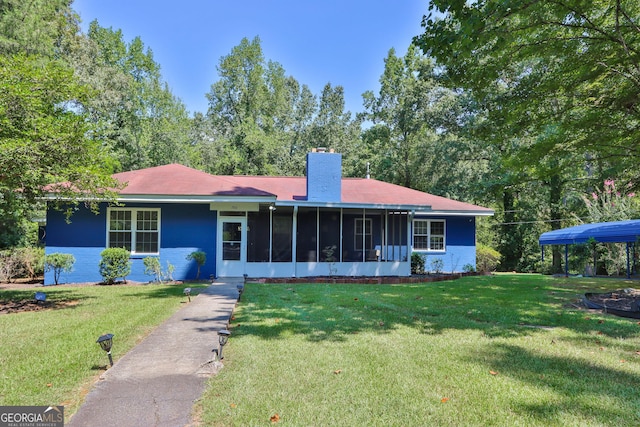 766 Blanton Blvd, Macon, GA 31210 - single story home featuring a front lawn, a sunroom, and a chimney