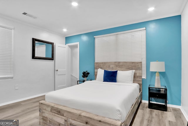766 Blanton Blvd, Macon, GA 31210 - bedroom featuring light wood finished floors, crown molding, baseboards, and recessed lighting