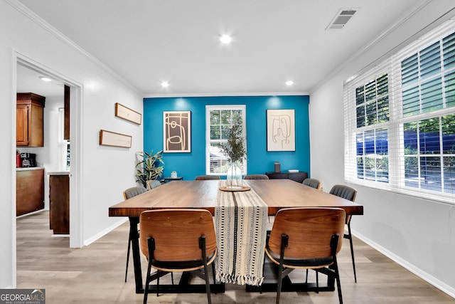 766 Blanton Blvd, Macon, GA 31210 - dining room featuring light wood-type flooring, recessed lighting, crown molding, and baseboards