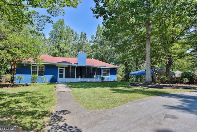 766 Blanton Blvd, Macon, GA 31210 - single story home with a chimney, a front yard, and a sunroom