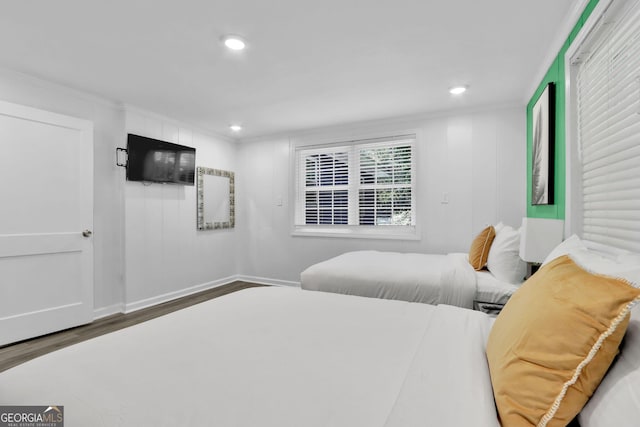 766 Blanton Blvd, Macon, GA 31210 - bedroom with wood finished floors, ornamental molding, baseboards, and recessed lighting