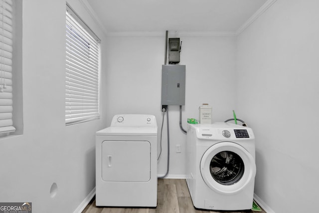 766 Blanton Blvd, Macon, GA 31210 - washroom with electric panel, separate washer and dryer, light wood finished floors, crown molding, and baseboards