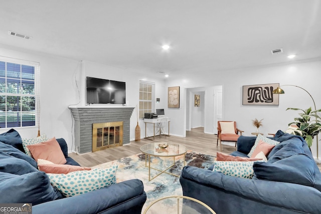 766 Blanton Blvd, Macon, GA 31210 - living area with wood finished floors, a fireplace, and recessed lighting