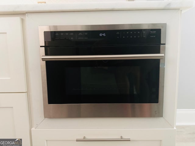 4867 Pinnacle Dr, Stone Mountain, GA 30088 - kitchen view of wall oven and light countertops