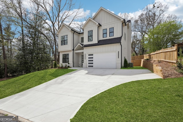 1253 Cumberland Valley Rd, Gainesville, GA 30501 - modern farmhouse style home featuring board and batten siding, concrete driveway, a garage, and a chimney