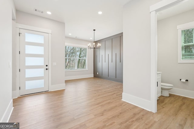 1253 Cumberland Valley Rd, Gainesville, GA 30501 - foyer with a chandelier, light wood-style flooring, baseboards, and recessed lighting