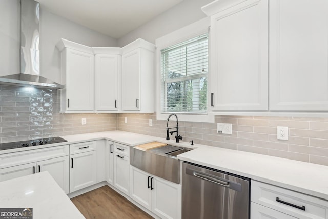 1253 Cumberland Valley Rd, Gainesville, GA 30501 - kitchen with stainless steel dishwasher, a sink, wall chimney range hood, light countertops, and black electric cooktop