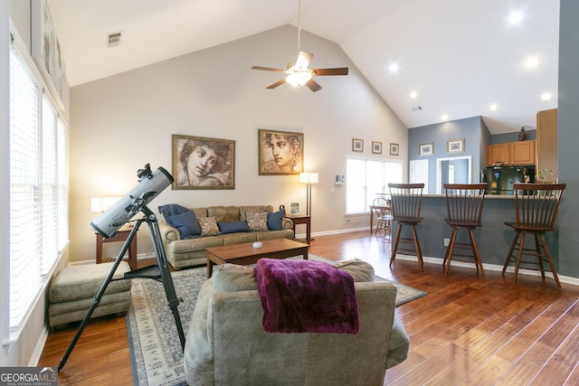 5365 Twin Creeks Dr, Norcross, GA 30071 - living area featuring high vaulted ceiling, light wood-style floors, a ceiling fan, baseboards, and recessed lighting