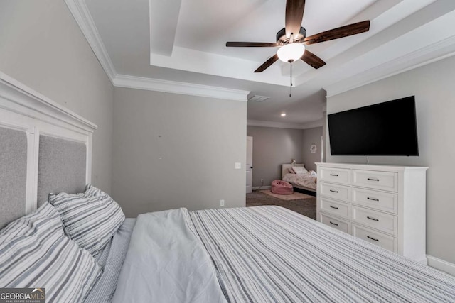 728 Harmony Rd, Temple, GA 30179 - carpeted bedroom with a raised ceiling, ornamental molding, a ceiling fan, and baseboards