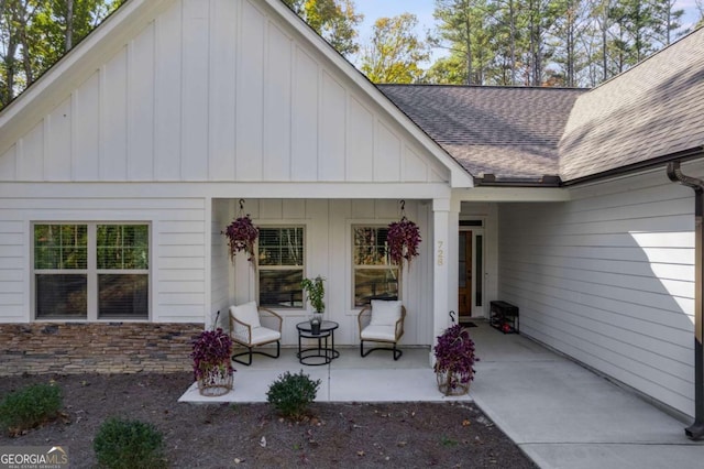 728 Harmony Rd, Temple, GA 30179 - property entrance with covered porch, board and batten siding, and a shingled roof