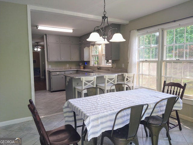 302 Morningside Dr, Clarkesville, GA 30523 - dining room with baseboards, healthy amount of natural light, light tile patterned floors, beam ceiling, and ceiling fan
