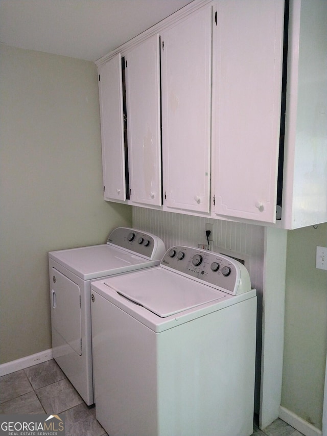 302 Morningside Dr, Clarkesville, GA 30523 - washroom featuring cabinet space, independent washer and dryer, baseboards, and light tile patterned flooring