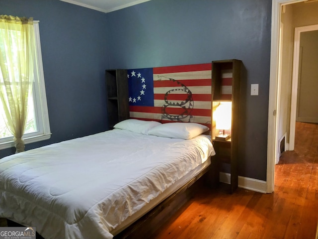 302 Morningside Dr, Clarkesville, GA 30523 - bedroom featuring hardwood / wood-style flooring, baseboards, and ornamental molding