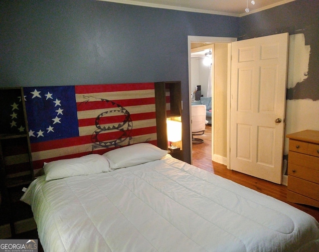 302 Morningside Dr, Clarkesville, GA 30523 - bedroom featuring wood finished floors and crown molding