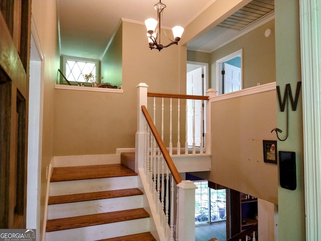 302 Morningside Dr, Clarkesville, GA 30523 - stairs featuring a chandelier and ornamental molding
