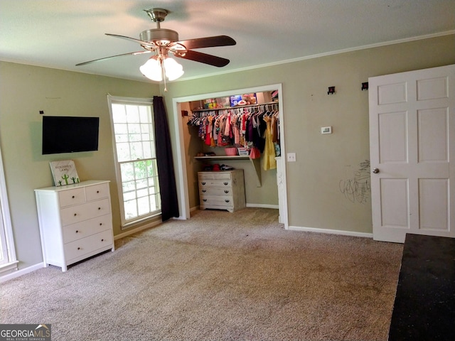 302 Morningside Dr, Clarkesville, GA 30523 - bedroom with carpet, a closet, a ceiling fan, baseboards, and crown molding