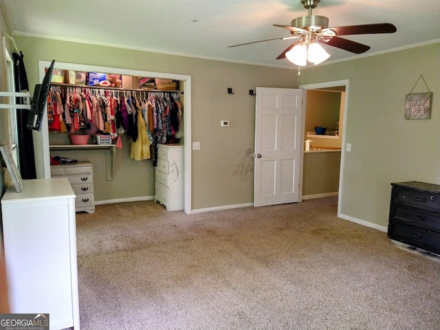 302 Morningside Dr, Clarkesville, GA 30523 - unfurnished bedroom featuring crown molding, carpet floors, baseboards, a closet, and a ceiling fan