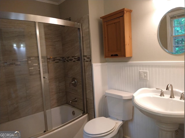 302 Morningside Dr, Clarkesville, GA 30523 - bathroom featuring enclosed tub / shower combo, toilet, and wainscoting
