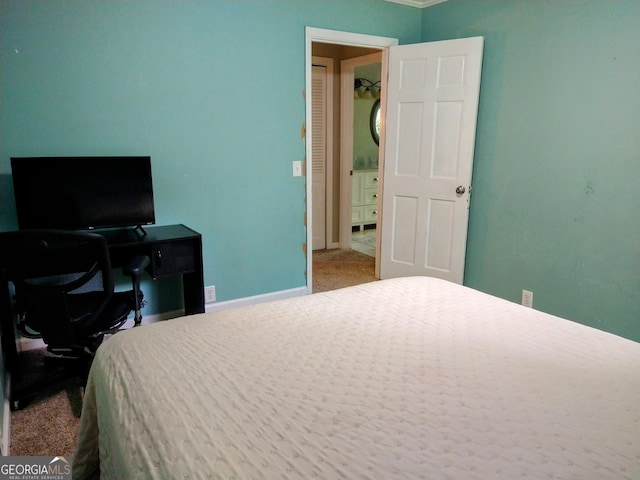 302 Morningside Dr, Clarkesville, GA 30523 - carpeted bedroom with a desk and baseboards