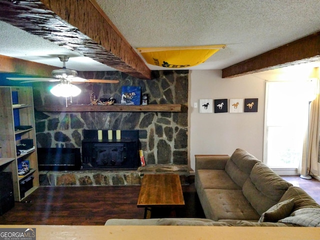 302 Morningside Dr, Clarkesville, GA 30523 - living room featuring a textured ceiling, a ceiling fan, a fireplace, and beam ceiling