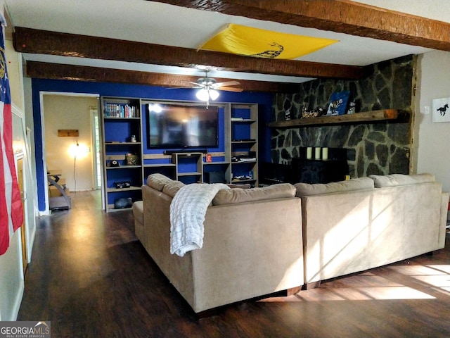 302 Morningside Dr, Clarkesville, GA 30523 - living area featuring beam ceiling, wood finished floors, ceiling fan, a stone fireplace, and built in shelves