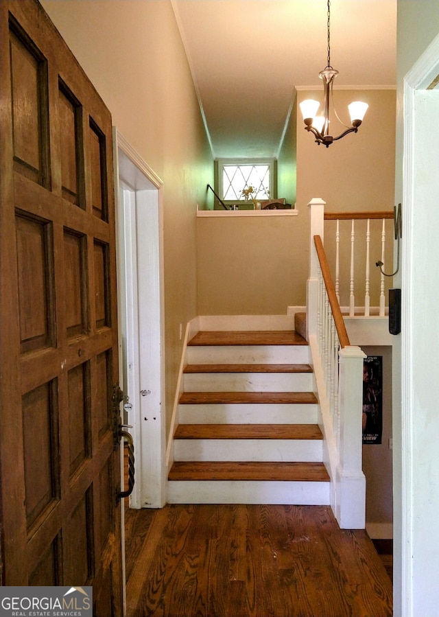 302 Morningside Dr, Clarkesville, GA 30523 - stairway with a chandelier, ornamental molding, and wood finished floors