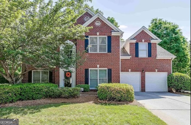 1008 Post Horn Run, Lawrenceville, GA 30045 - view of front of house with driveway, an attached garage, and brick siding