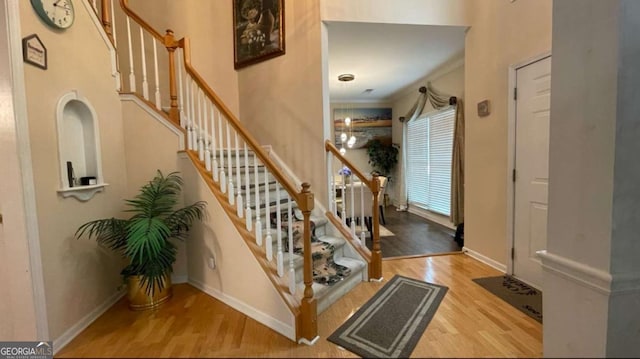 1008 Post Horn Run, Lawrenceville, GA 30045 - foyer entrance with wood finished floors and stairway