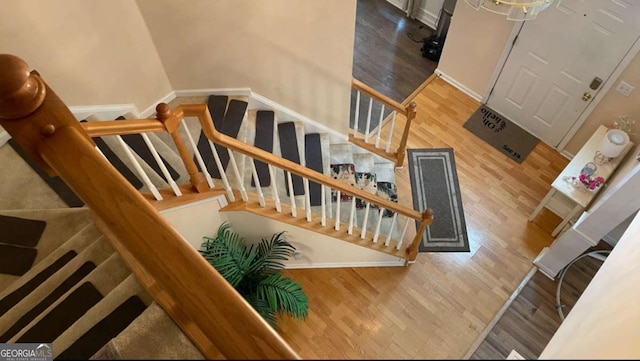 1008 Post Horn Run, Lawrenceville, GA 30045 - stairs with wood finished floors and baseboards