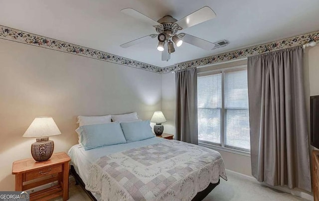 1008 Post Horn Run, Lawrenceville, GA 30045 - bedroom featuring light colored carpet, multiple windows, and a ceiling fan