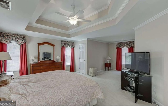 1008 Post Horn Run, Lawrenceville, GA 30045 - bedroom featuring multiple windows, crown molding, a tray ceiling, carpet flooring, and ceiling fan