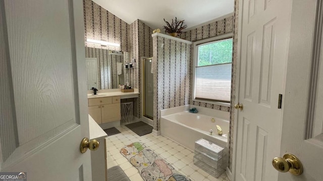 1008 Post Horn Run, Lawrenceville, GA 30045 - bathroom featuring wallpapered walls, a stall shower, vanity, and a garden tub