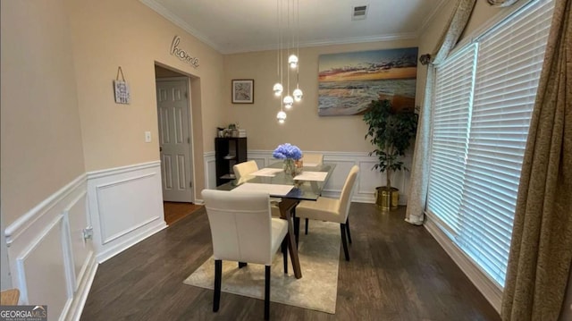 1008 Post Horn Run, Lawrenceville, GA 30045 - dining space featuring dark wood-type flooring, crown molding, a decorative wall, and a wainscoted wall