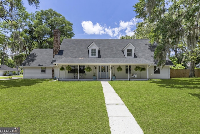 107 Rose Dhu Way, Savannah, GA 31419 - cape cod house featuring a porch, a shingled roof, and a chimney