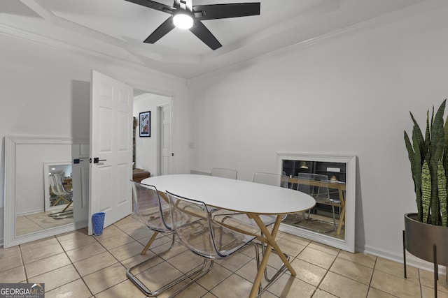 107 Rose Dhu Way, Savannah, GA 31419 - dining room featuring a raised ceiling, a ceiling fan, and light tile patterned flooring