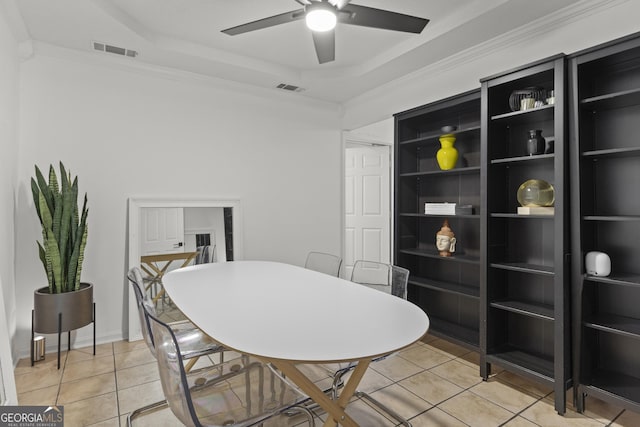 107 Rose Dhu Way, Savannah, GA 31419 - dining room featuring a ceiling fan, light tile patterned floors, a raised ceiling, and crown molding