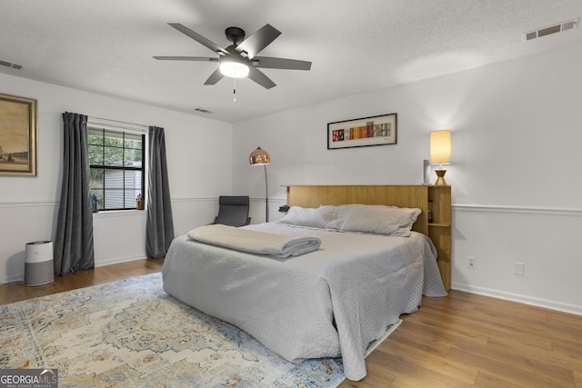107 Rose Dhu Way, Savannah, GA 31419 - bedroom featuring wood finished floors, baseboards, and a ceiling fan