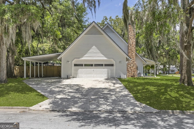 107 Rose Dhu Way, Savannah, GA 31419 - view of front of home featuring driveway, a chimney, and a garage