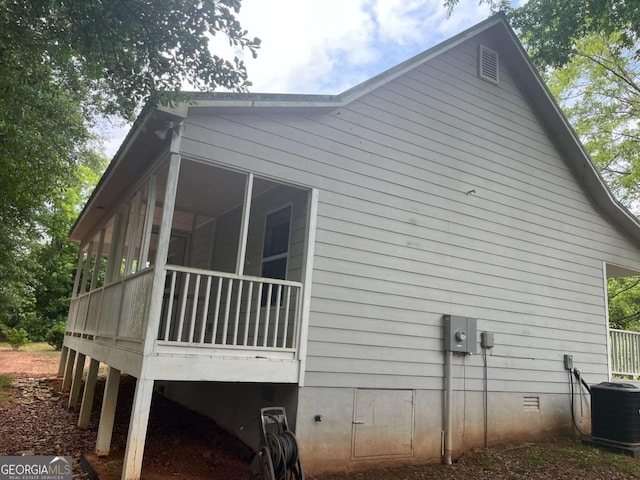 1429 Thyatira Brockton Rd, Jefferson, GA 30549 - view of home's exterior with crawl space, central air condition unit, and a sunroom