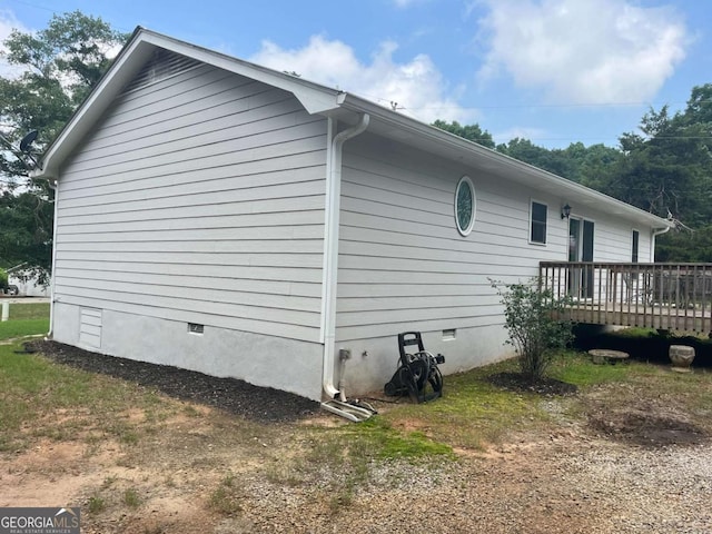 1429 Thyatira Brockton Rd, Jefferson, GA 30549 - view of side of home with crawl space and a deck