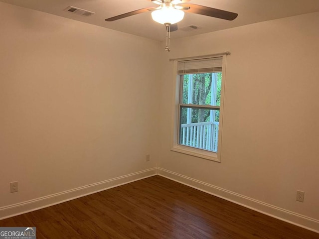 1429 Thyatira Brockton Rd, Jefferson, GA 30549 - spare room featuring baseboards, ceiling fan, and dark wood-style flooring
