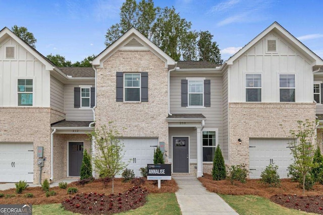 377 Navigator Ln, Mcdonough, GA 30253 - townhome / multi-family property with board and batten siding and an attached garage